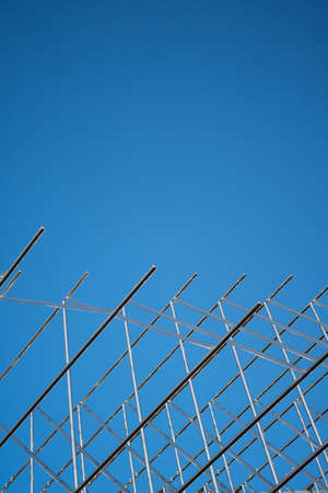 Metal Structure against Clear Blue Sky with Copy Space Verticalの写真素材