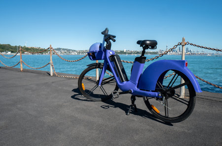E-Bike on the Waterfront overlooking Auckland City, New Zealand on a Bright Sunny Day