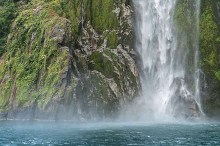 Close-Up of Stirling Waterfall in Milford Sound Fiordland National Park in the South Island of New Zealand on a Sunny Dayの写真素材
