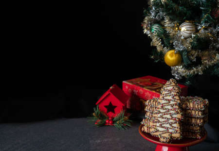 Christmas tree Cookies Beside Christmas tree and Gift with Copy Space Horizontal