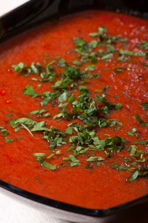 Spicy vindaloo sauce in a bowl isolated on a white background.の写真素材