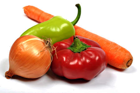 Fresh vegetables: green and red pepper, carrot, cabbage, onion and cauliflower.の写真素材