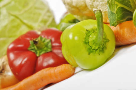 Fresh vegetables: green and red pepper, carrot, cabbage, onion and cauliflower.の写真素材