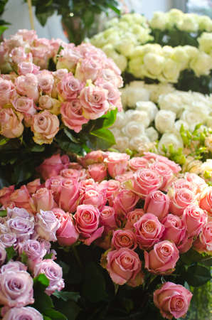 A fancy market with flowers in baskets and nice decorations.の写真素材
