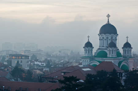 Aerial view of Bucharest in a foggy day, with Casin Church in front.の写真素材