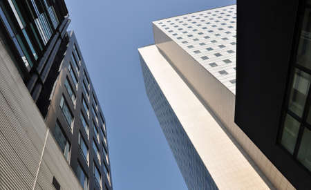 Business building in a sunny day, with a beautiful blue sky.の写真素材