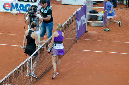 Bucharest, Romania -  July 10, 2014: Image from the central arena of BNR Arenas, during the tennis match between no.1 Romanian tennis player, Simona HalepRomania and Aleksandra KrunicBulgariaのeditorial素材
