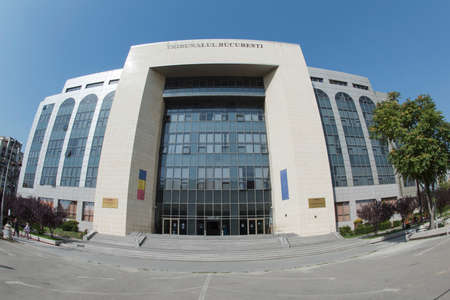 BUCHAREST, ROMANIA â September 18, 2015 Facade of the Bucharest Courthouse placed on Unirii Boulevard.のeditorial素材