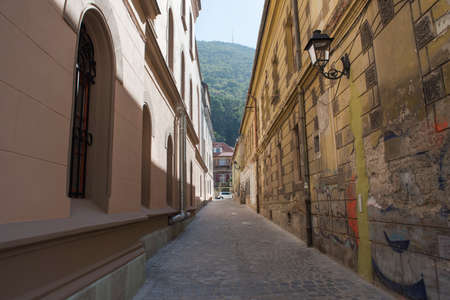Narrow street in Brasov city, Romania