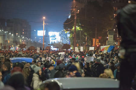 Bucharest, Romania  November 4, 2015: For a second consecutive night, over 30.000 people gathered at the University Square in Bucharest and protest against the government and the corruption.のeditorial素材