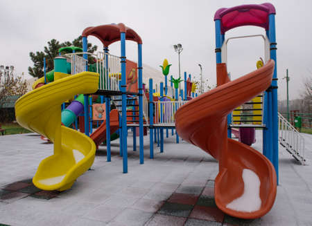 First snow over a children's playground.の写真素材