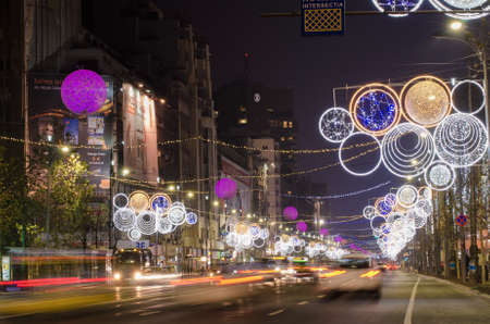 Bucharest, Romania â December 11, 2013: Nightscene in Bucharest center when the Christmas lights and decorations are on.のeditorial素材