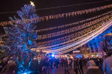 BUCHAREST, ROMANIA - DECEMBER 03, 2015: Christmas market at night in Bucharest downtown, at the University Square.のeditorial素材