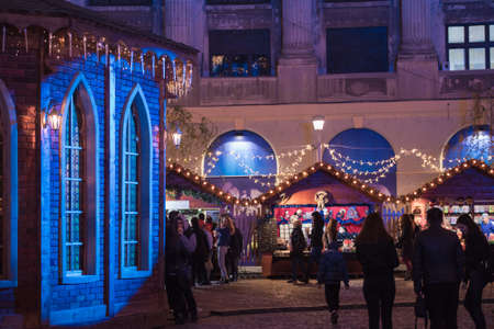 BUCHAREST, ROMANIA - DECEMBER 03, 2015: Christmas market at night in Bucharest downtown, at the University Square.のeditorial素材