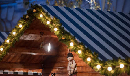 Wood house with Christmas decoration in a Christmas Marketの写真素材