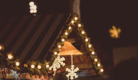 Wood house with Christmas decoration in a Christmas Marketの写真素材