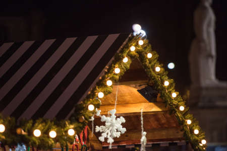 Wood house with Christmas decoration in a Christmas Marketの写真素材