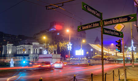Bucharest, Romania â December 6, 2015: Bucharest nightlife in December with Christmas decorations.のeditorial素材
