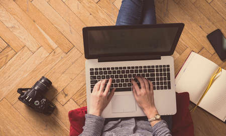 Modern workspace - girl with laptop working.