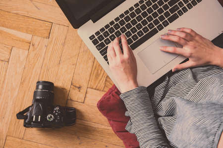 Modern workspace - girl with laptop working.