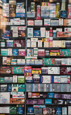 Bucharest, Romania â February 07, 2016: Pharmacy showcase with medical pills.のeditorial素材