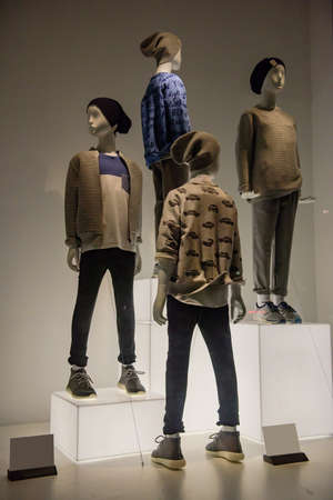 Mannequins inside a clothing store.
