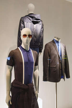 Mannequins inside a clothing store.