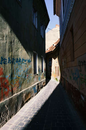 Narrow street in Brasov city.の写真素材
