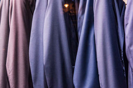 Elegant  suits in a men clothing shop.の写真素材