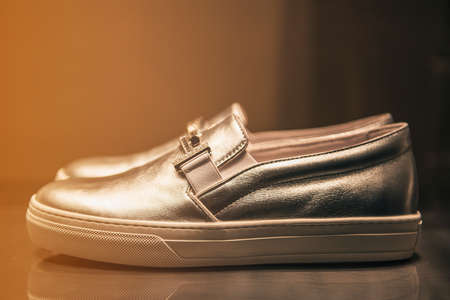 Luxury shoes in a showcase of a storeの写真素材