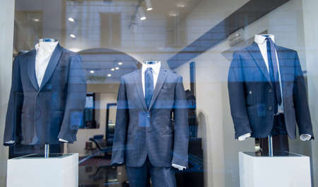 Men suits in a luxury clothing storeの写真素材