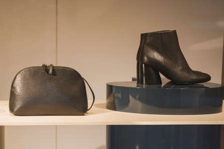 Shoes and accesories in a clothing storeの写真素材