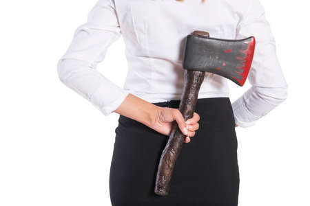 Girl with a bloody axe in a business clothing, isolated.の写真素材