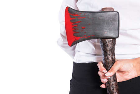 Girl with a bloody axe in a business clothing, isolated.の写真素材