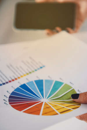 Woman holding business reportsの写真素材