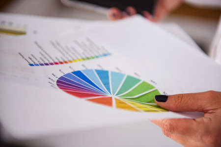 Woman holding business reportsの写真素材