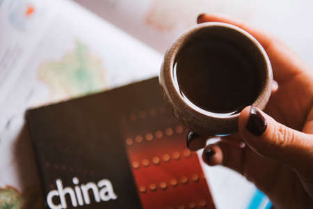 Drinking tea and thinking of Chinaの写真素材