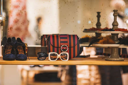 sun glasses and purses in a luxury store