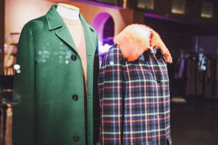 Mannequin in a showcase of a clothing storeの写真素材