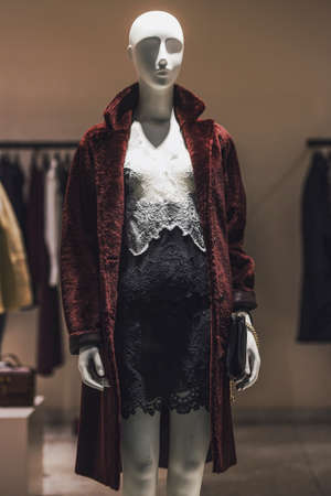 Mannequin in a showcase of a clothing storeの写真素材
