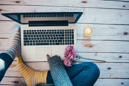 Home office concept: girl working at homeの写真素材