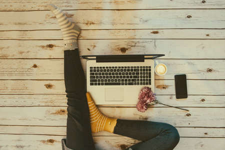 Home office concept: girl working at homeの写真素材