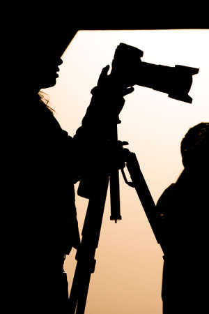 photographer silhouette at sunset