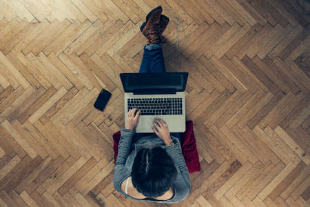 startup concept: girl working from homeの写真素材