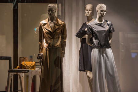 Fancy clothing on mannequins in a store in London.