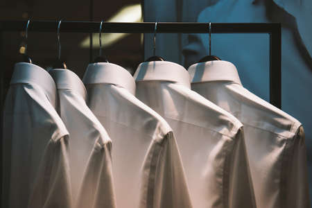 Men shirts on hangersの写真素材