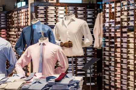 Man shirts in a fashion store in London.の写真素材