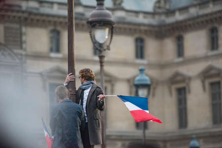Paris, France - Crowds celebrate Macron's victory at the Louvre Museum after presidential elections.のeditorial素材