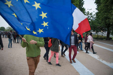 Paris, France - May 7, 2017: Crowds celebrate Macron's victory at the Louvre Museum after presidential elections.のeditorial素材