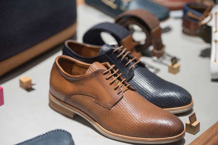 Men shoes in a store in Paris.の写真素材